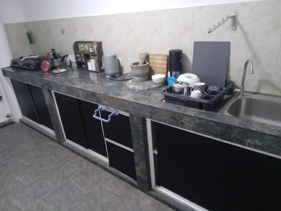 Villa | Private kitchen | Fridge, microwave, oven, stovetop