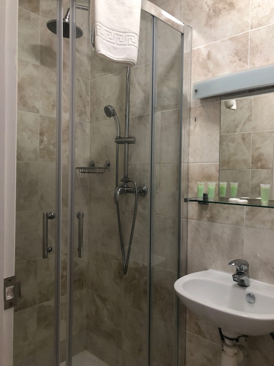 Hair dryer, towels, soap, shampoo