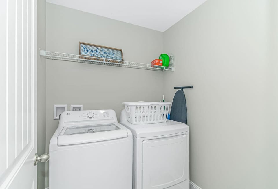 Laundry room with washer and dryer convenient for longer stays and family trips