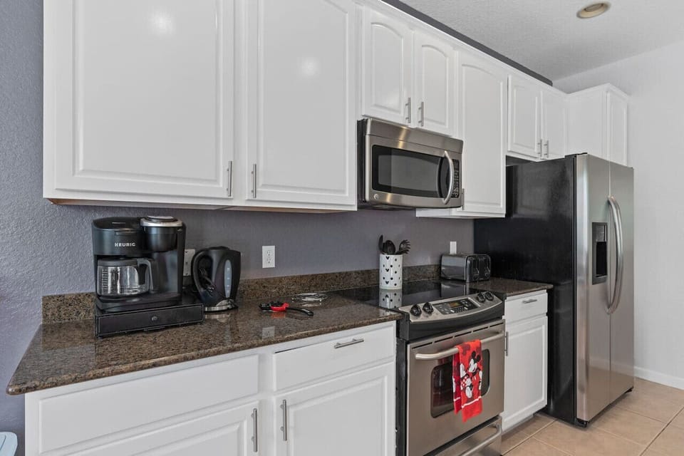 Enjoy cooking in this clean, stylish kitchen.