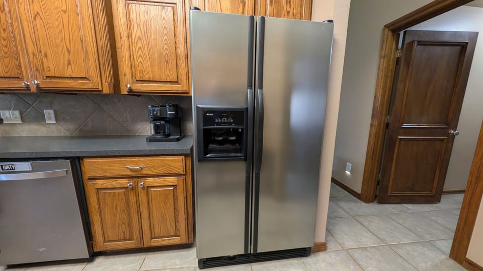 Full Fridge, Coffee Maker and supplies, Dishwasher. 