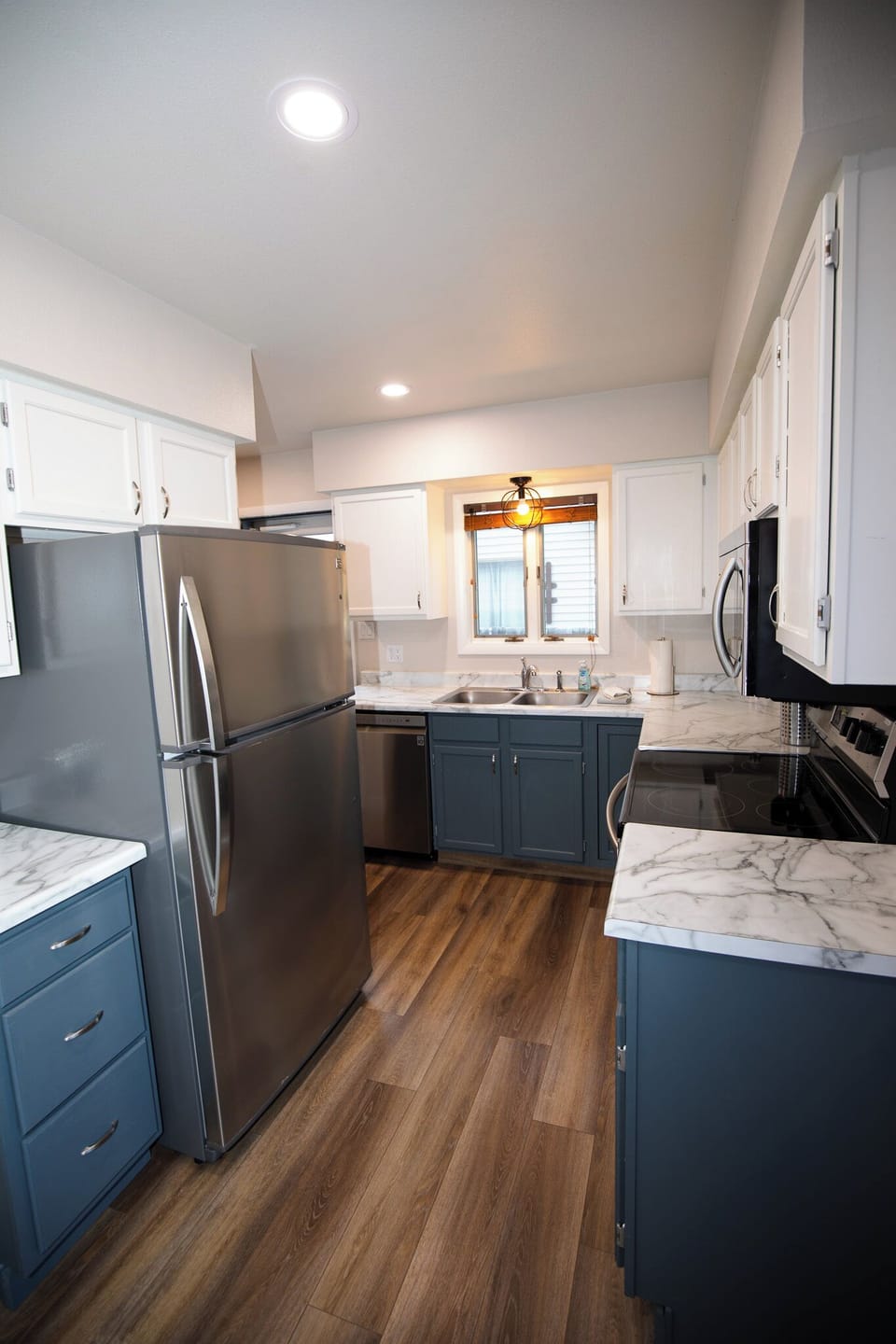Bright kitchen with updated appliances makes preparing meals a pleasure