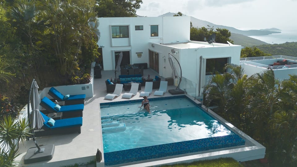 A serene pool deck with plush loungers—perfect for soaking up the Caribbean sun.