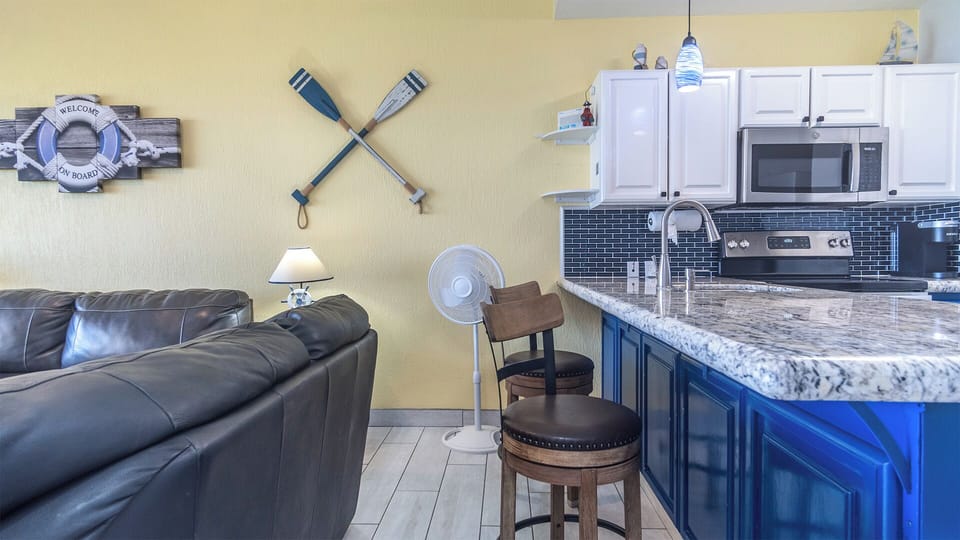 Bar stools at the kitchen counter.