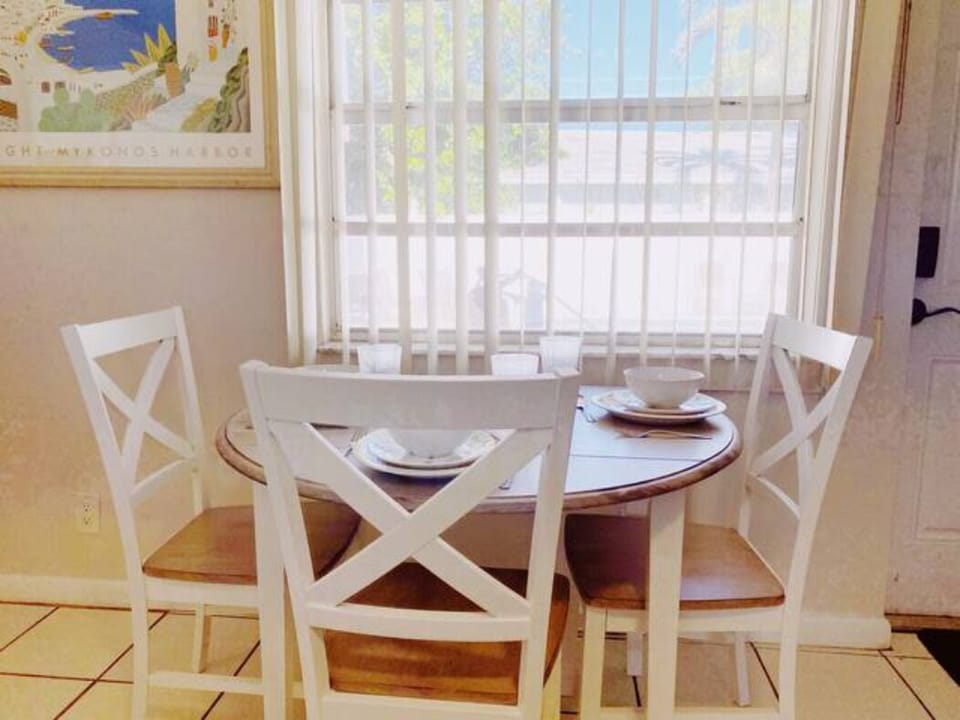 Dining Table with a pool view.