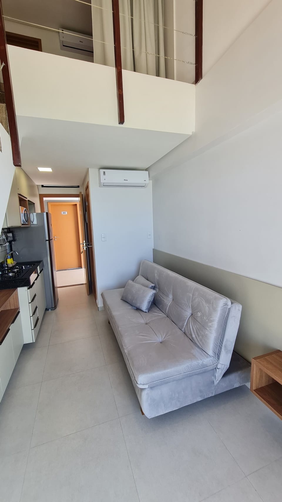 Comfort Duplex, Lagoon View | Living area | Flat-screen TV