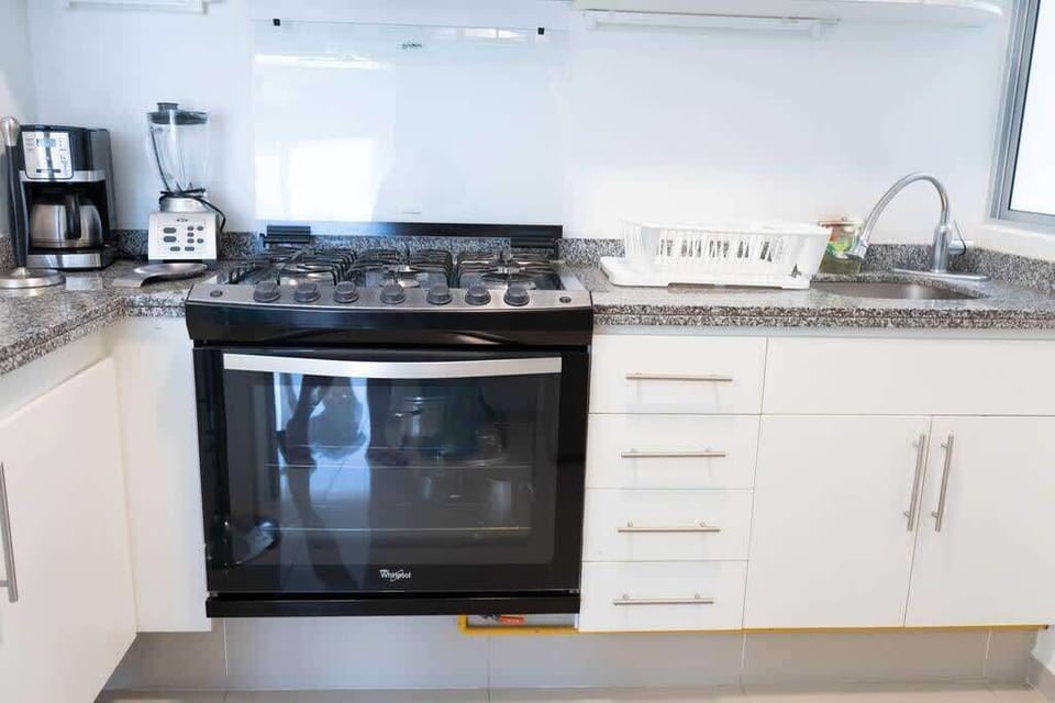 Kitchen with stove and oven