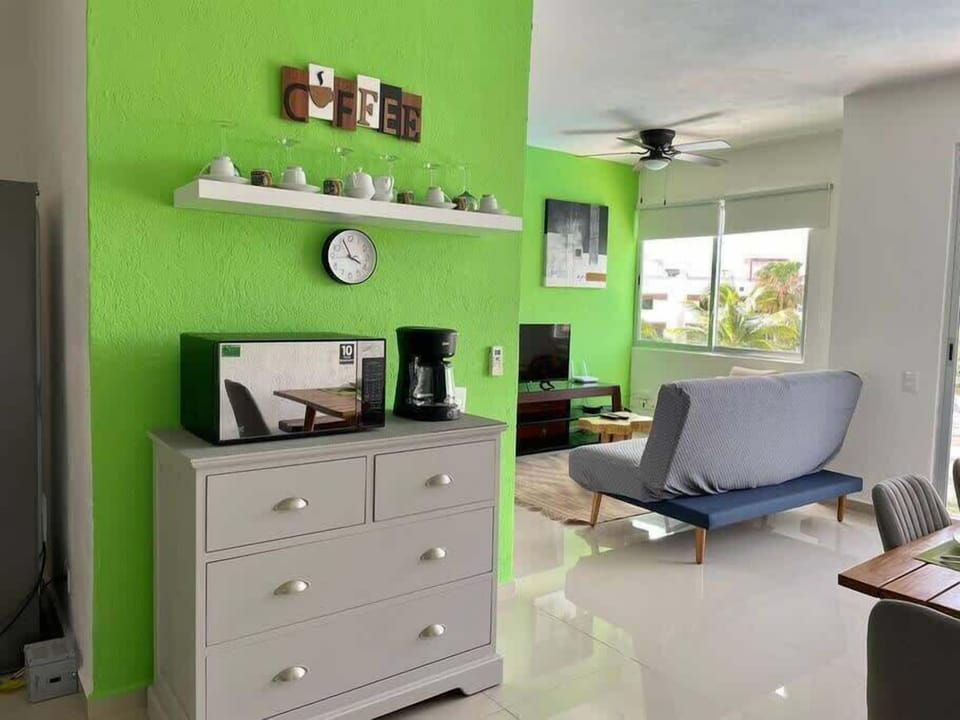Bedroom with workspace and TV