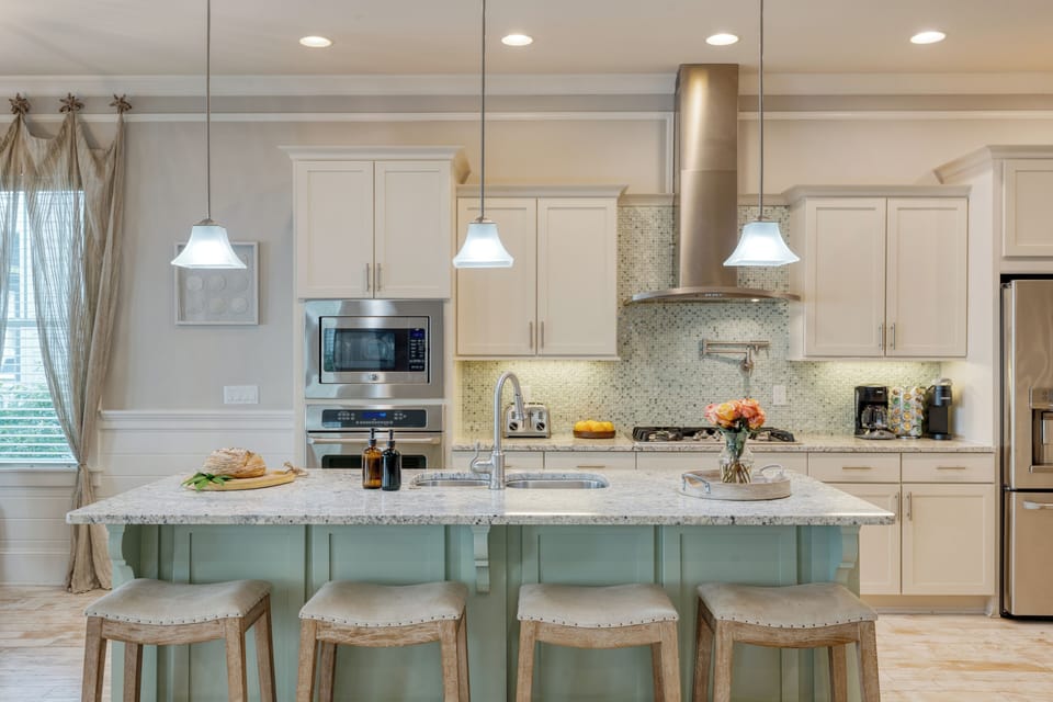Barstool seating at the kitchen island.