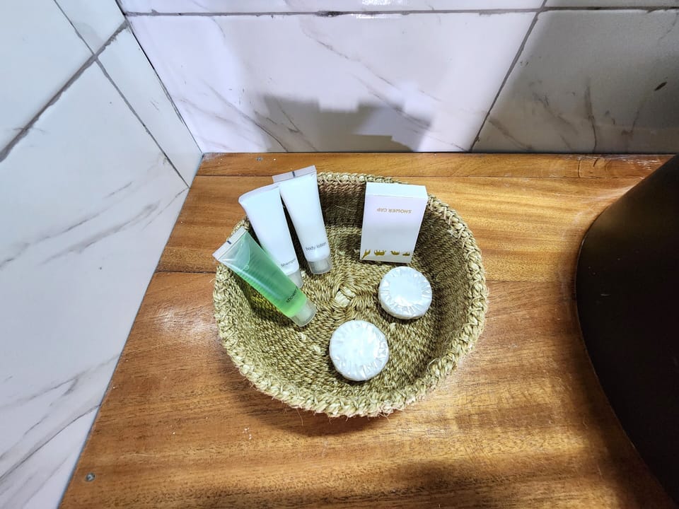 Standard Single Room, 1 Large Twin Bed, Non Smoking, Ground Floor | Bathroom | Shower, slippers, towels, soap