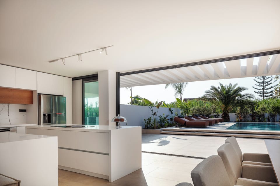 The seamless blend of contemporary design and natural beauty creates an atmosphere of pure relaxation and joy.