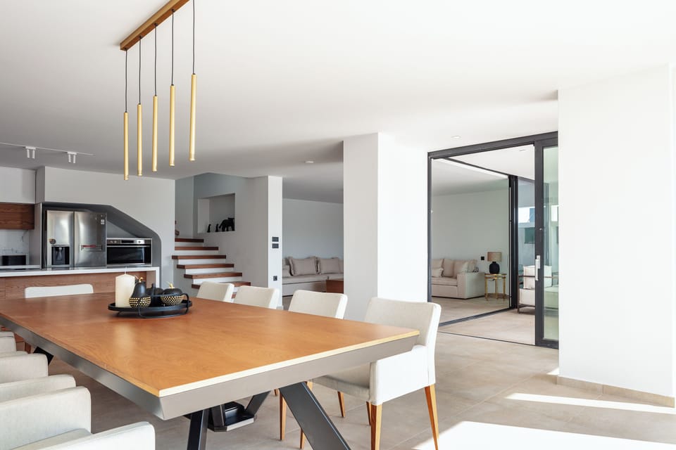 The elegant 10-seat dining table awaits, inviting you to create unforgettable meals and moments with your loved ones.