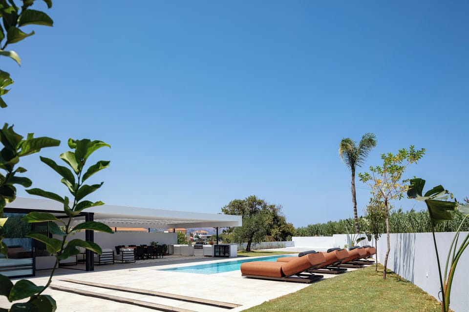 The exterior of Villa Nuera IV spans 700 m², offering an unparalleled haven of tranquility