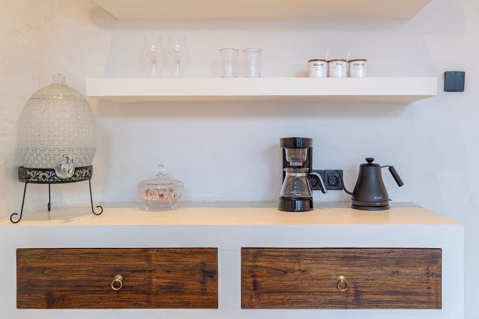 Honeymoon Villa | Private kitchenette | Microwave, coffee/tea maker, electric kettle, highchair