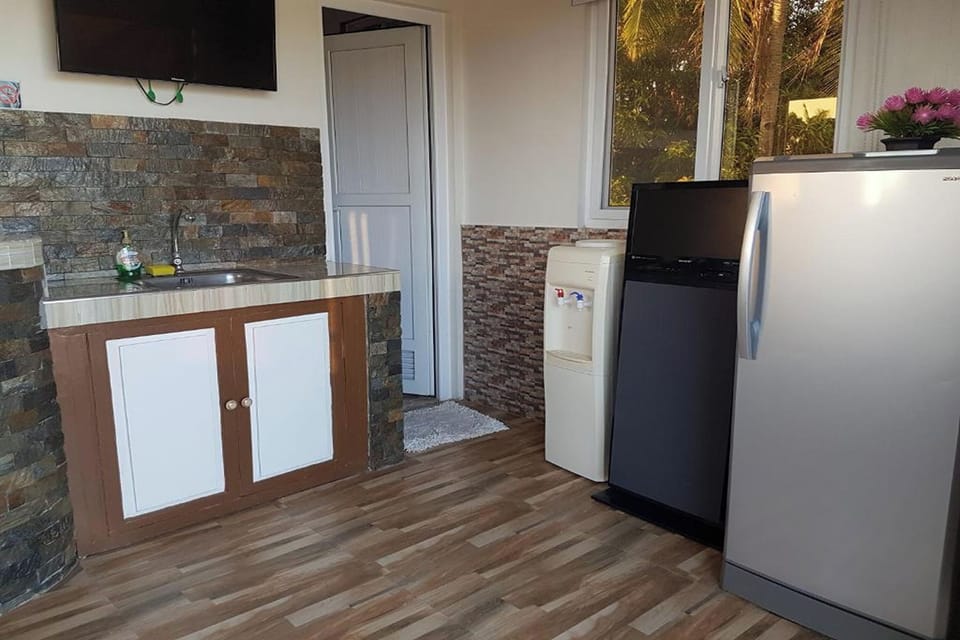 Family Double Room | Living area | 32-inch LCD TV with satellite channels