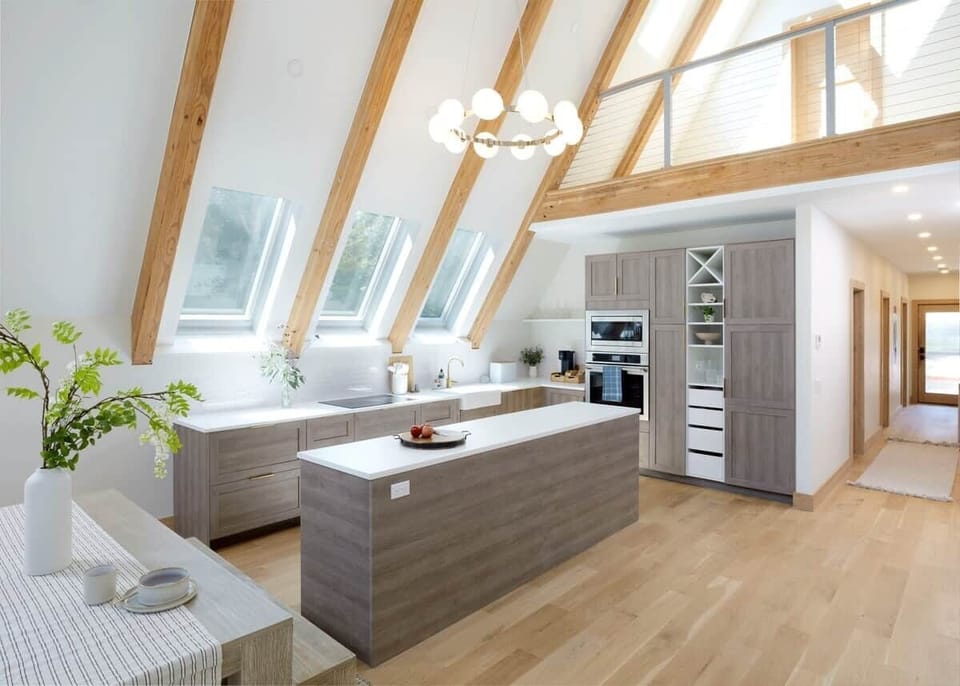A culinary workspace featuring custom cabinetry.