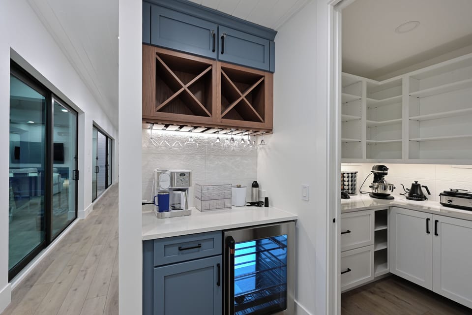 Coffee area (whole pot or K cups) - wine/beverage fridge.