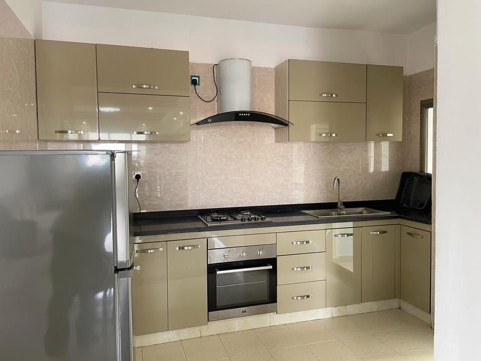 Business Room, 2 Bedrooms | Private kitchen | Full-size fridge, microwave, electric kettle, paper towels