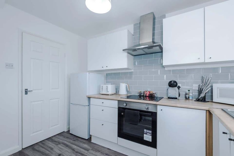 The fully equipped kitchen has everything you need for a long or short stay in Greater Manchester.