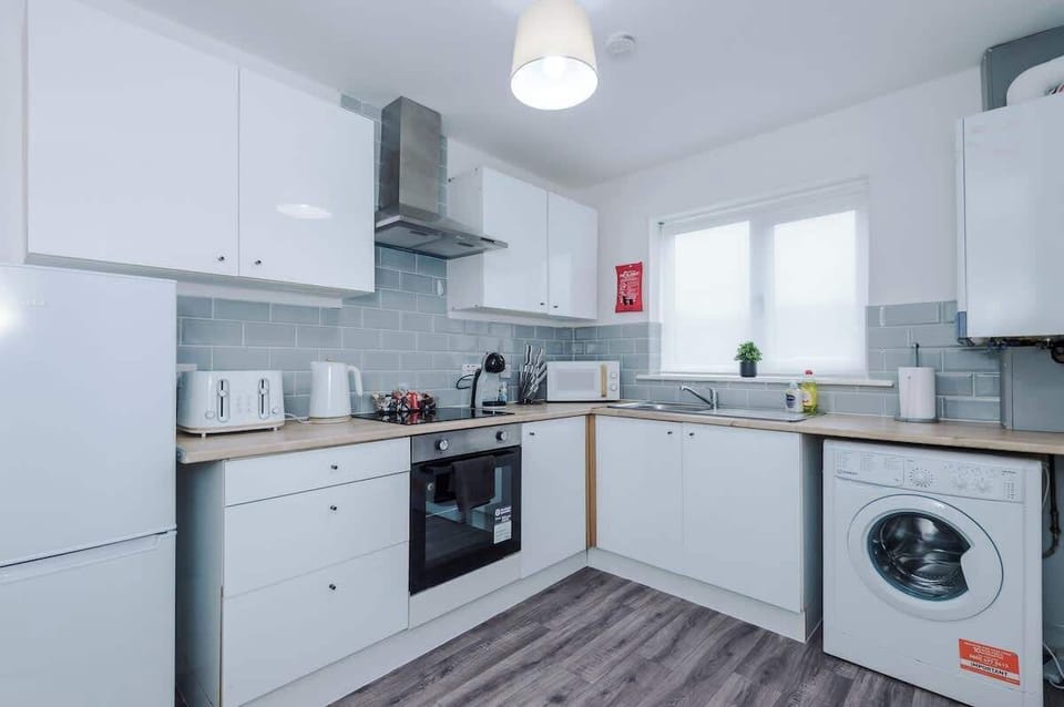 The fully equipped kitchen has everything you need for a long or short stay in Greater Manchester.