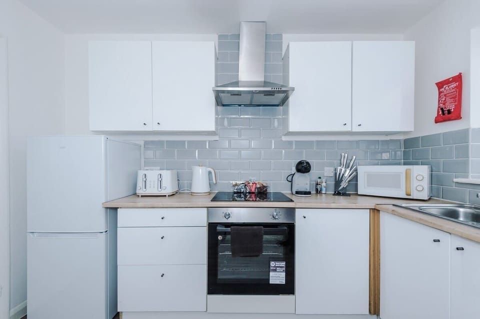 The fully equipped kitchen has everything you need for a long or short stay in Greater Manchester.