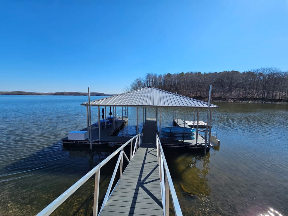 New covered dock + kayaks ready to launch