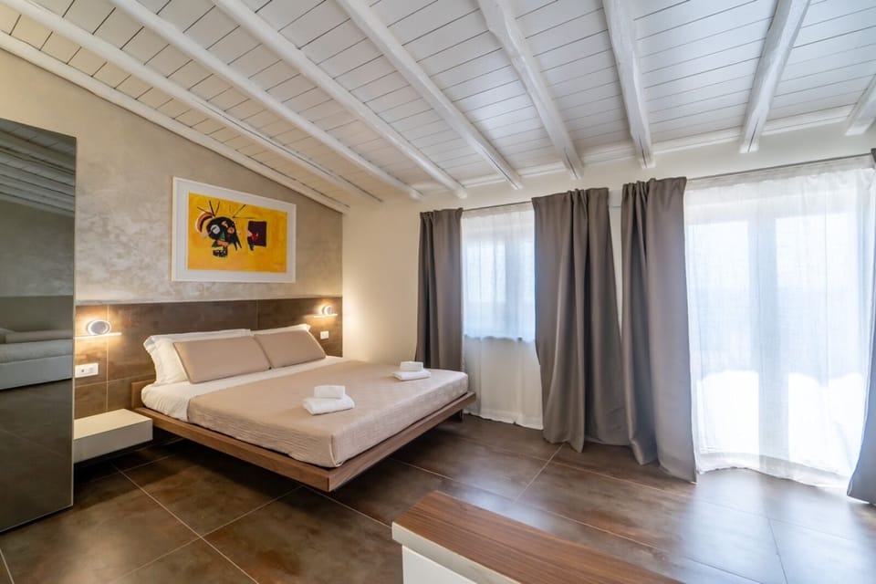 Panoramic Quadruple Room, Private Bathroom, Sea View | Premium bedding, minibar, individually decorated, individually furnished