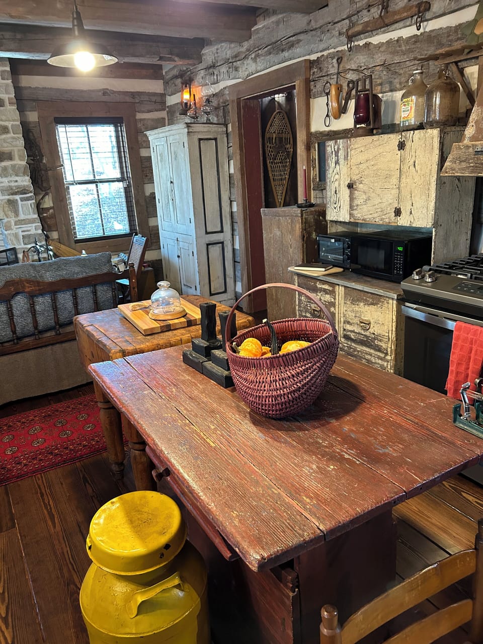 1800’s dough table and old butcher block become kitchen island counter.