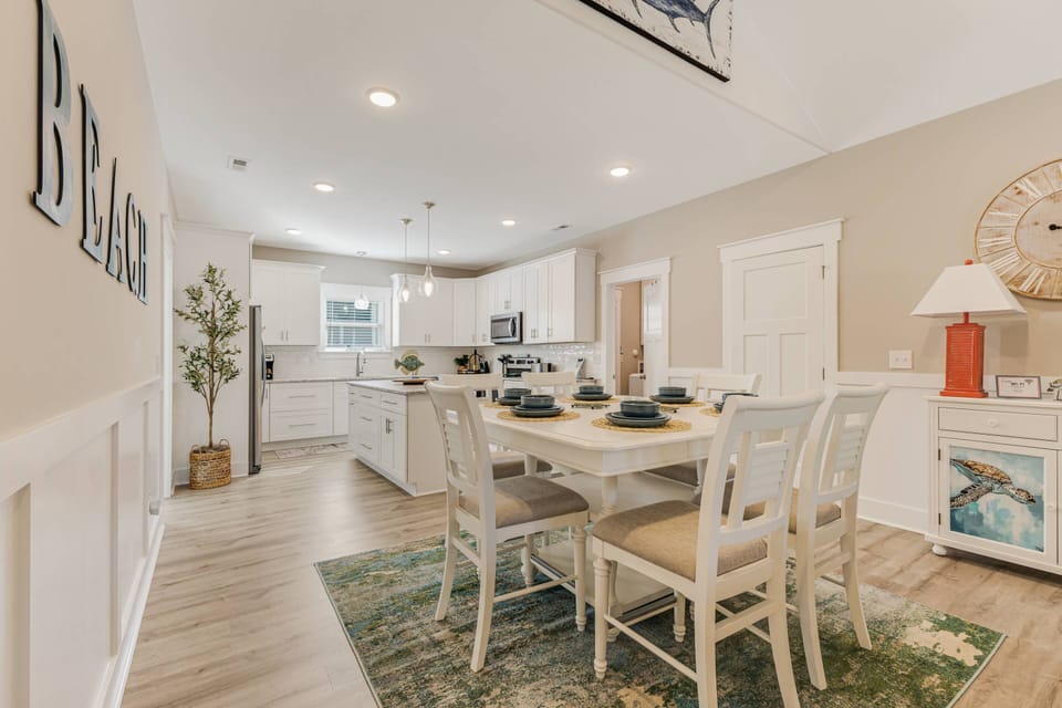 Gather around the dining area that seats six, conveniently next to the kitchen.