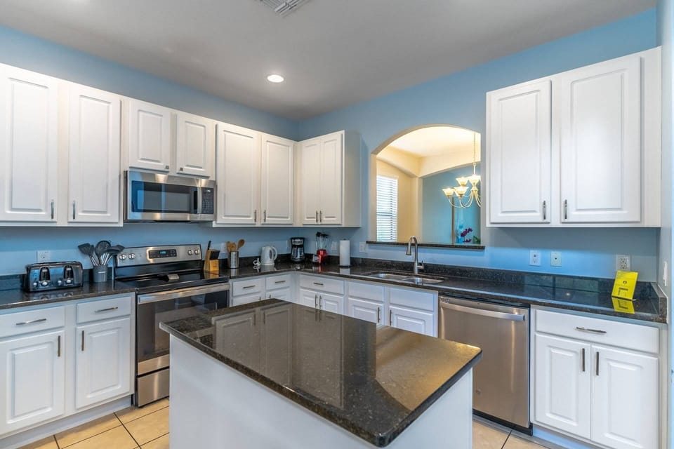 Large Kitchen with Stainless steel appliances, Grainate countertops and all of the comforts of home!