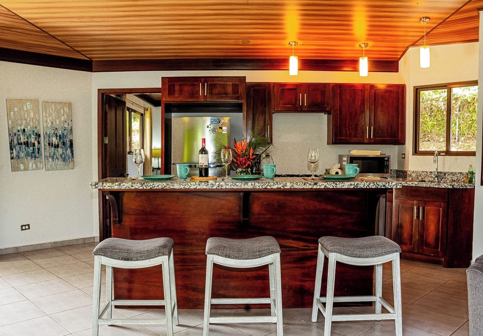 A beautifully designed kitchen with striking features and modern touches.