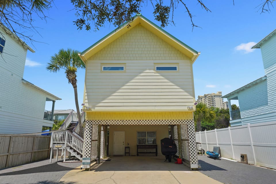 There is a bedroom on the bottom floor with a private bathroom!  Make your way up the stairs on the side of the house to enter the house.  Inside is the living room, kitchen and 2 bedrooms and 2 bathrooms. 
