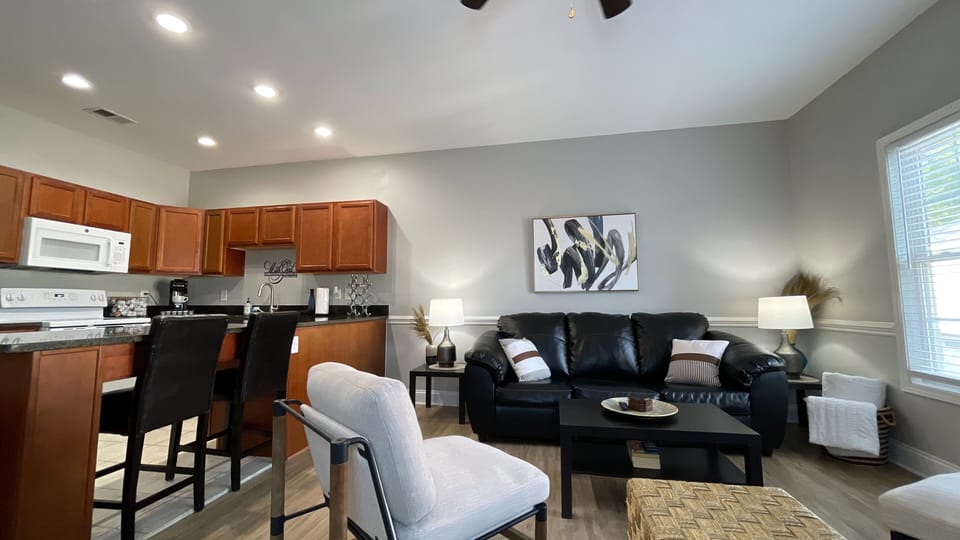 Enjoy stunning views from our lovely living room, just steps away from the kitchen for easy snacking!