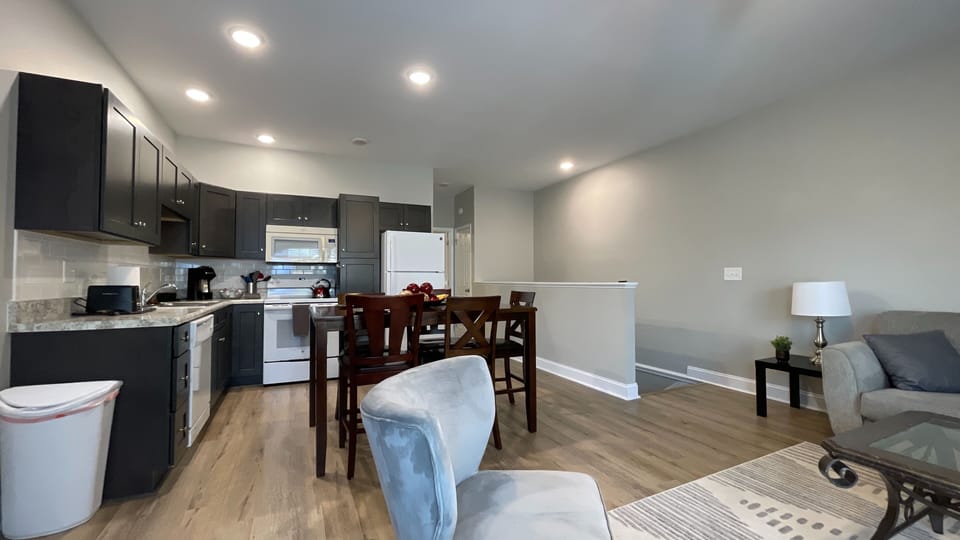 Welcome to your stylish retreat, where an aesthetic living room meets a cozy kitchen ambiance!