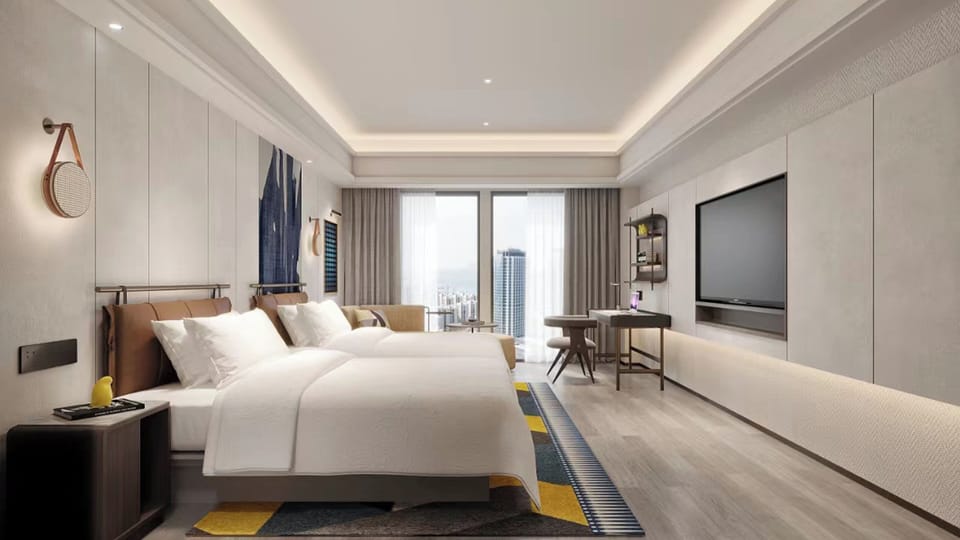 Premium bedding, down comforters, minibar, desk