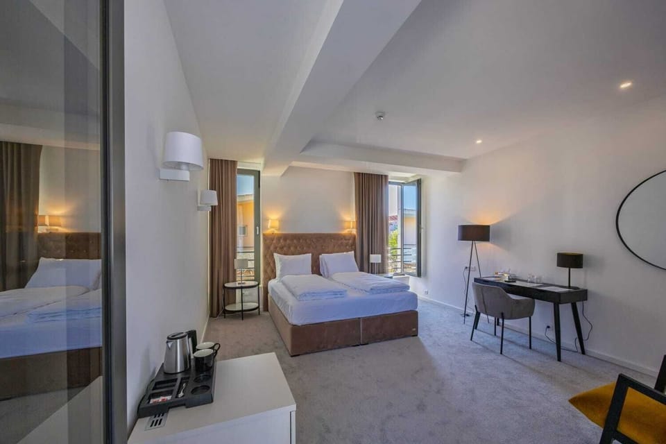 Deluxe Room, Balcony, Mountain View | In-room safe, desk, blackout drapes, soundproofing