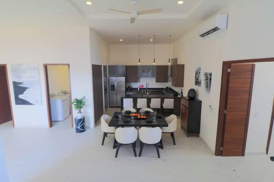 High Ceilings, bright and spacious dining room and kitchen area, washer & dryer