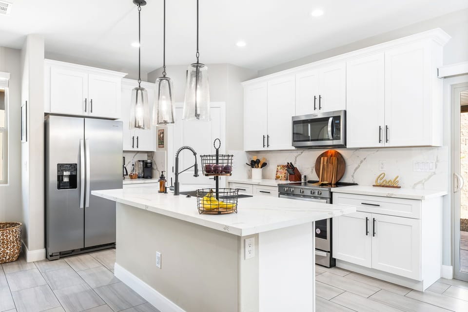 Overstocked kitchen, Kuerig and regular coffee pot w/ essential small appliances