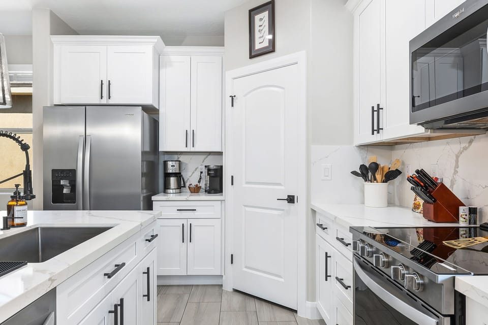Overstocked kitchen, Kuerig and regular coffee pot w/ essential small appliances