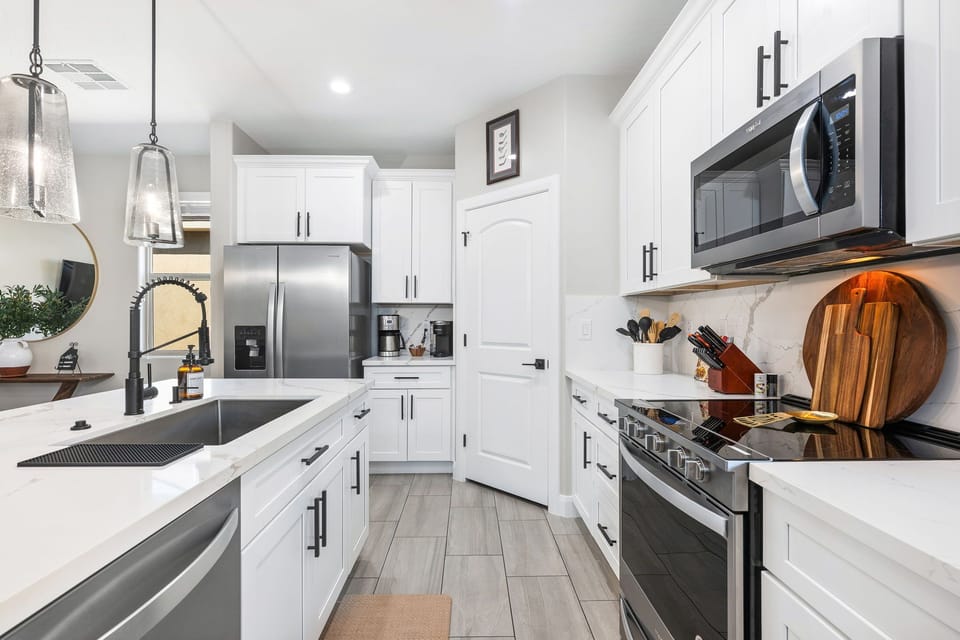 Overstocked kitchen, Kuerig and regular coffee pot w/ essential small appliances