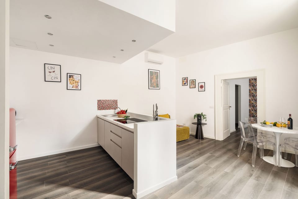 Deluxe Apartment, 2 Bedrooms | Living area | 32-inch LED TV with digital channels