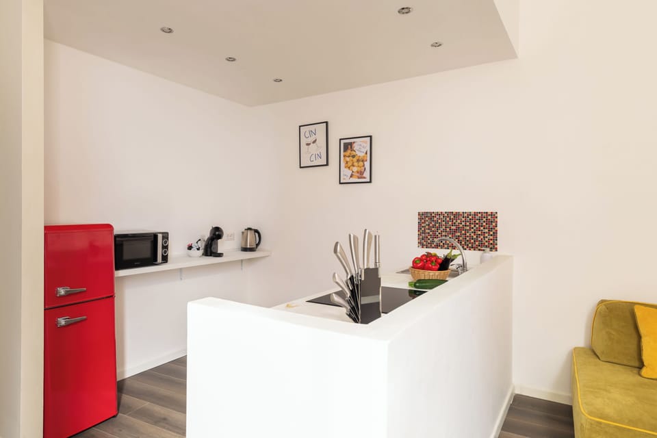 Deluxe Apartment, 2 Bedrooms | Private kitchen | Full-size fridge, microwave, stovetop, espresso maker