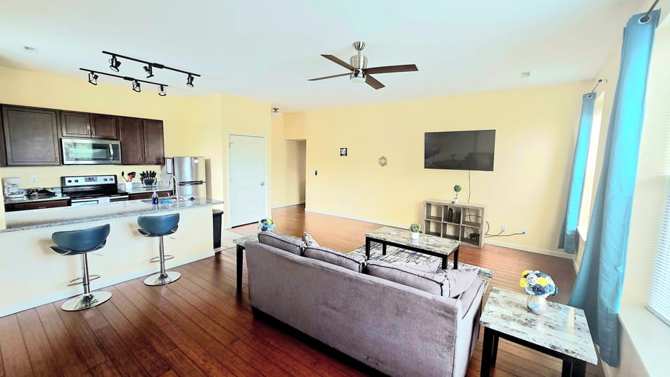 The cozy living room is designed for relaxation and entertainment.