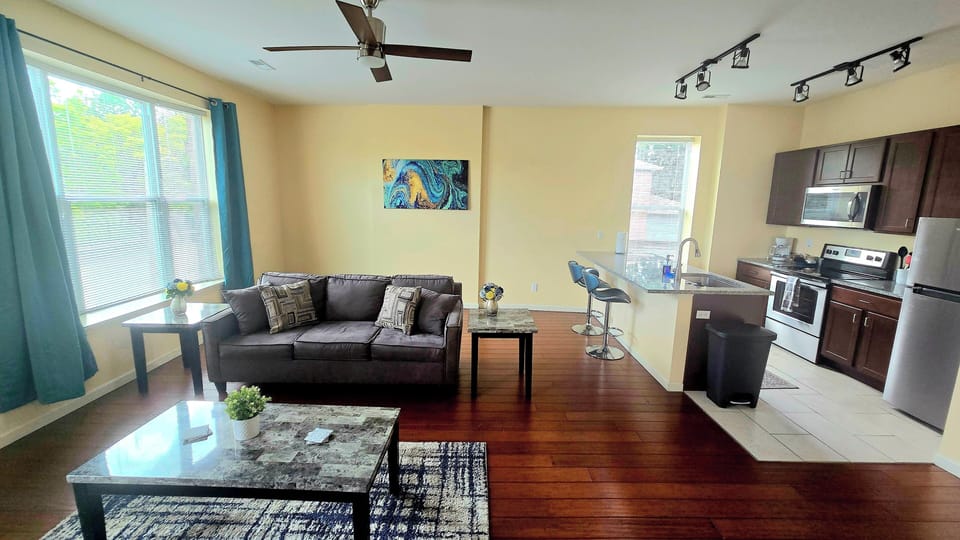 The cozy living room is designed for relaxation and entertainment.