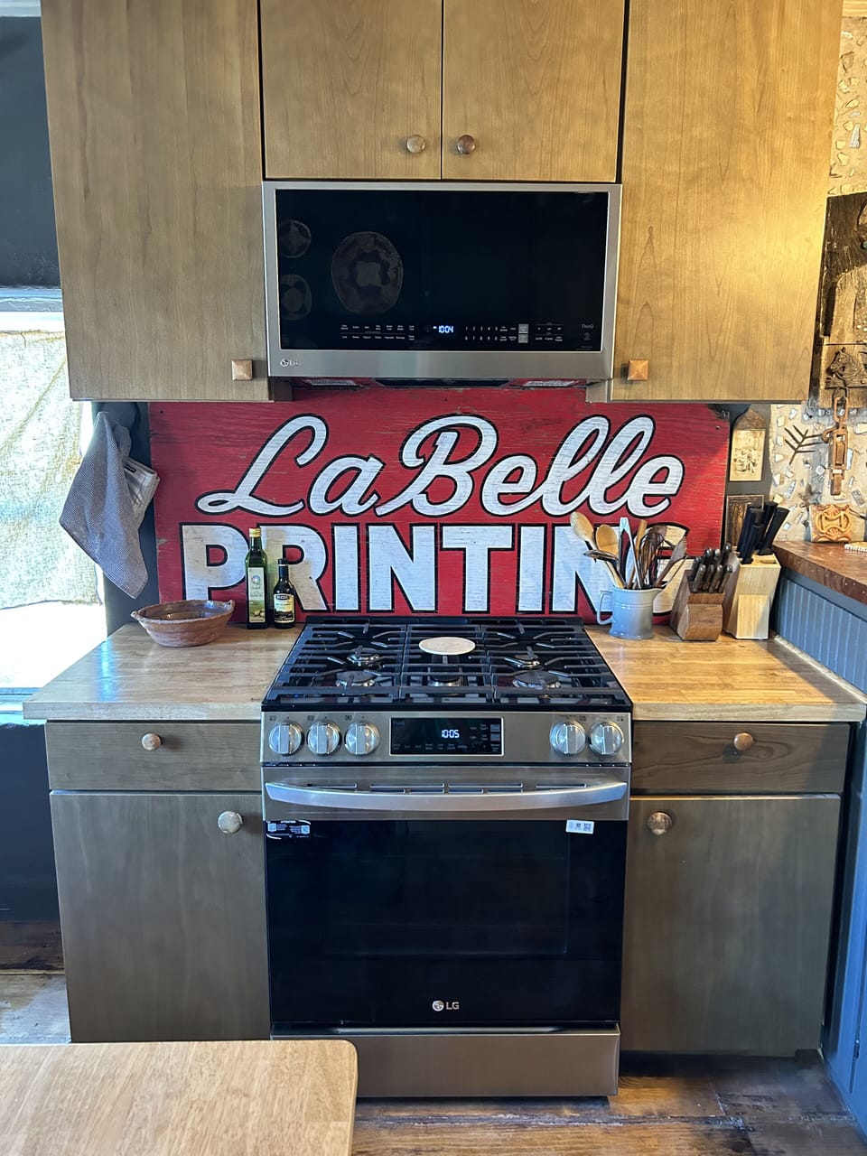 Kitchen with oven and microwave