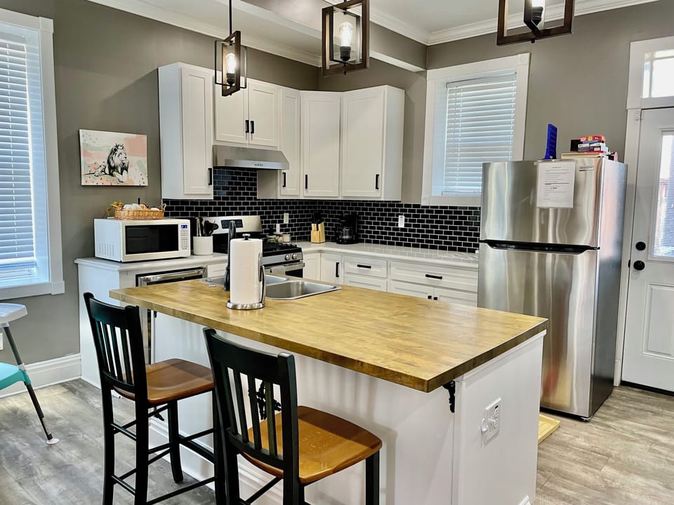 Kitchen with lots of cooking amenities and dishwasher. Plenty of prep space