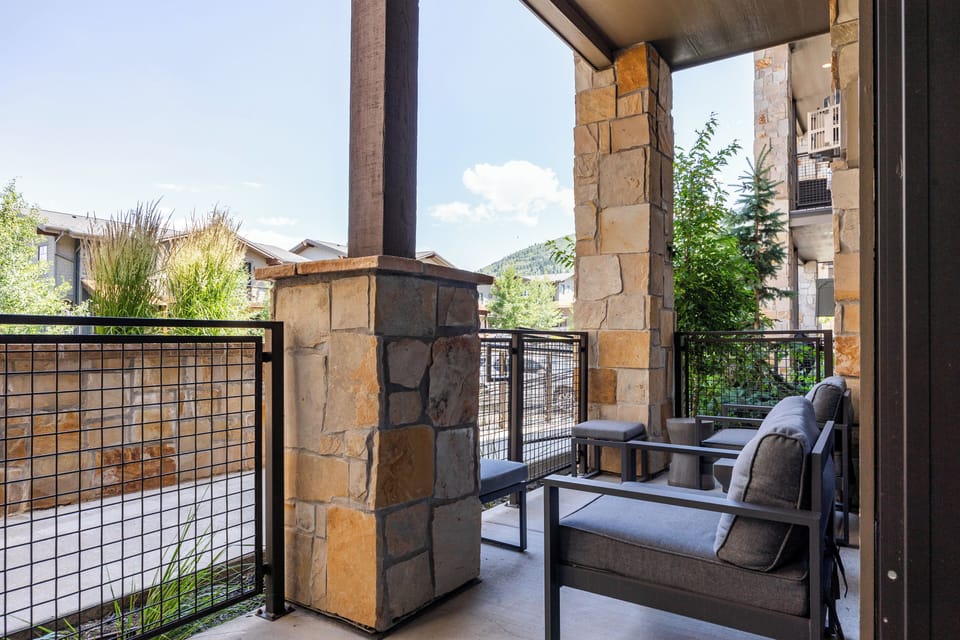 Relax on the sheltered patio with cushioned seating and fresh mountain air. A great spot for morning coffee or winding down after adventures.