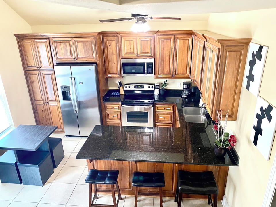Modern kichen with dining and bar stools