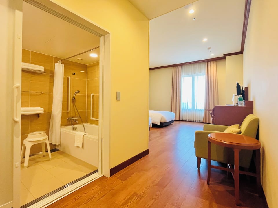 Standard Twin Room, 2 Bedrooms, Roll-in Shower, Non Smoking | In-room safe, desk, blackout drapes, iron/ironing board