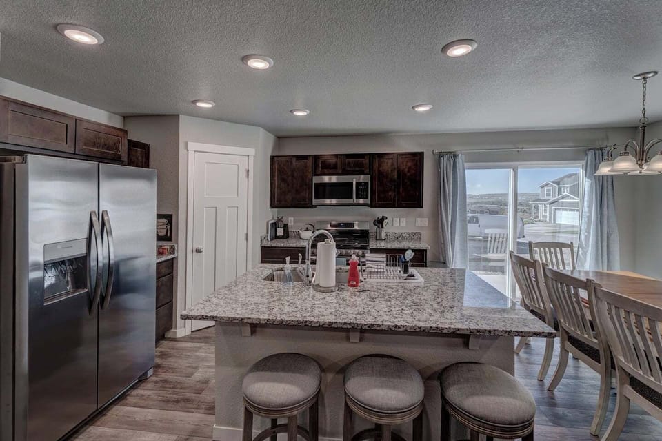 Full-size kitchen with all the standard appliances, cookware, and utensils